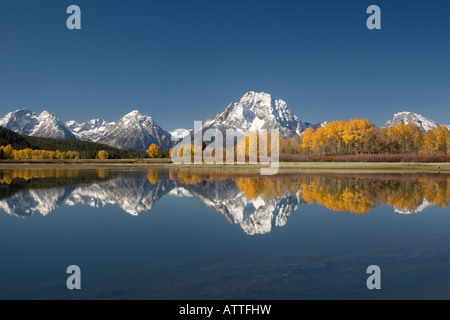 Perfect Fall / Autumn reflection of Teton Mountain Range from Oxbow Bend at Sunrise Stock Photo
