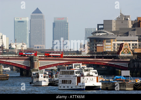 thames, south, view of canary wharf, blackfriars bridge, london, bus, boat, boats, water, bridge, buildings Stock Photo