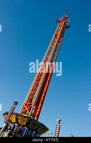 The drop tower ride at carnival Stock Photo - Alamy