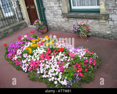 patio garden outside residential home in Shepton Mallet East Sussex Stock Photo