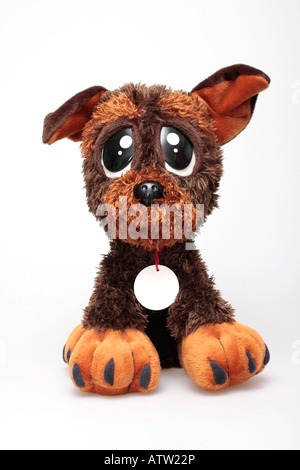 Childs soft cuddly toy in the shape of a puppy dog Stock Photo