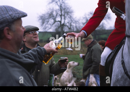 Riders of the Taunton Vale Hunt in Somerset sharing pre Hunt drinks with supporters Stock Photo