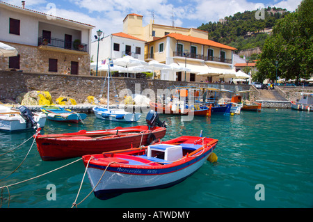 Circular walled harbour with colorful fishing boats at Nafpaktos Greece Stock Photo