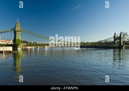 Hammersmith Bridge crossing River Thames at Hammersmith London England UK Stock Photo