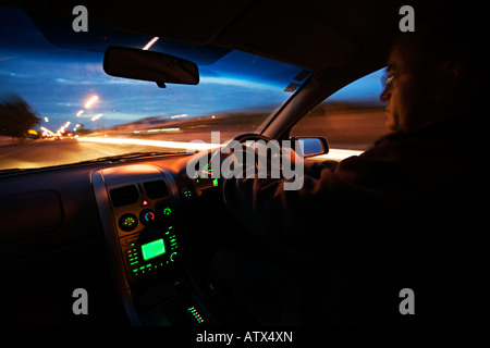 Night Drive Holden Commodore 2003 model at night in New Zealand Stock Photo