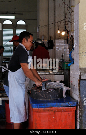 A fish monger in Kuching Stock Photo
