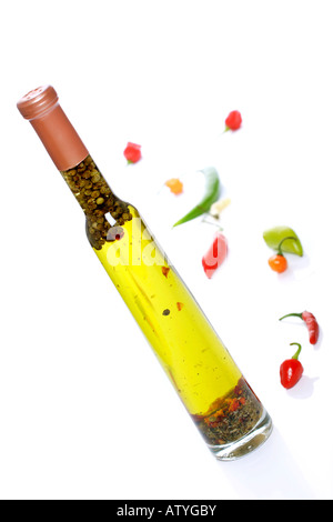 oil and assorted mixed peppers Stock Photo