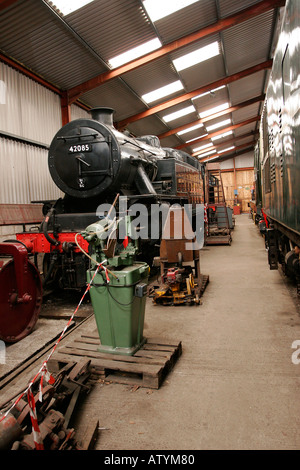 Steam Engine in the repair sheds at Haverthwaite station, Cumbria Stock Photo