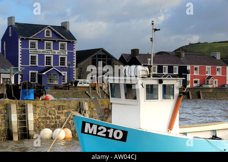 Aberaeron Harbour, Wales, with fishing boat in foreground Stock Photo