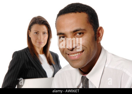 Businessman with team member in the background. Stock Photo