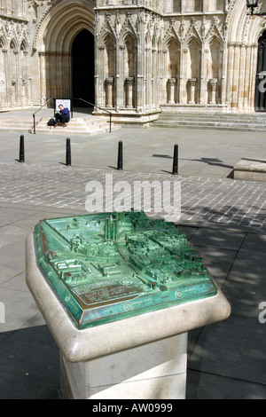 A relief map of York in bronze stands in the pedestrian area at the end of High Petergate Stock Photo
