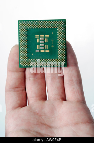 Computer processor detail close up in man hand Stock Photo