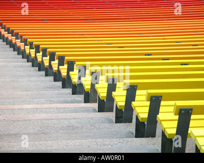Colours of Benches from Yellow to Red Stock Photo
