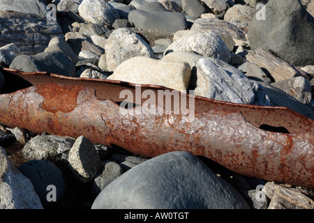 The remains of an old rusted pipe on the shoreline of Fort Dearborn which is an old Military fort located in Rye New Hampshire. Stock Photo