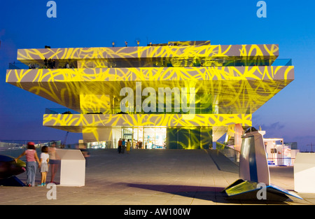 Louis Vuitton building in the port of Valencia illuminated for the Stock Photo: 16430718 - Alamy