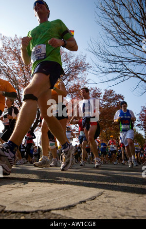 Low angle shot competitors in the 2006 ING New York City Marathon near the 10 mile mark in Brooklyn 5 November 2006 JMH1863 Stock Photo