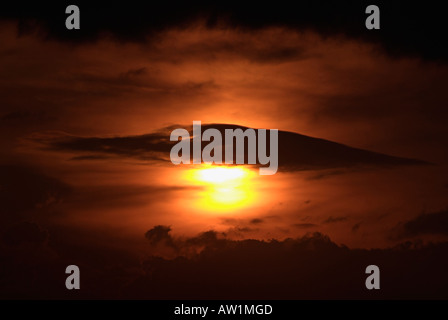 Sunset in a Dark Cloudy Sky Stock Photo