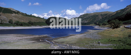 Low water in Haweswater Reservoir in the Lake District National Park Cumbria England Stock Photo