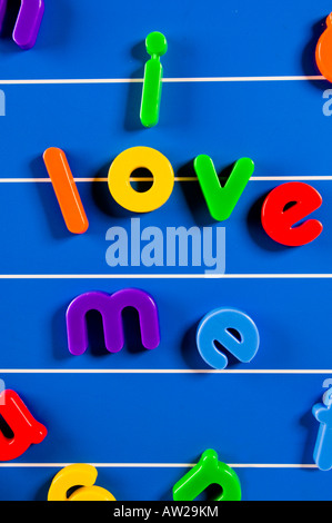 An image showing fridge magnet letters saying 'I love me' Stock Photo