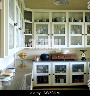Kitchen larder with mesh cupboards and marble surfaces in zimbabwean farmhouse Stock Photo