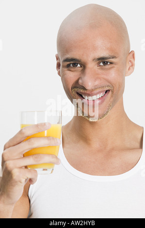 Young Handsome Bald Man Drinking Glass Of Healthy Orange Juice Covering Mouth With Hand Shocked And Afraid For Mistake Surprised Expression Stock Photo Alamy