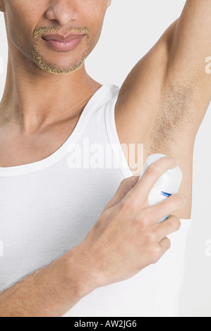 Man Applying Deodorant Stock Photo Alamy man-applying-deodorant-stock-photo-alamy