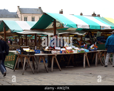 a fruit and veg.market stall and market trader at chesterfield market,Derbyshire,england,UK. Stock Photo