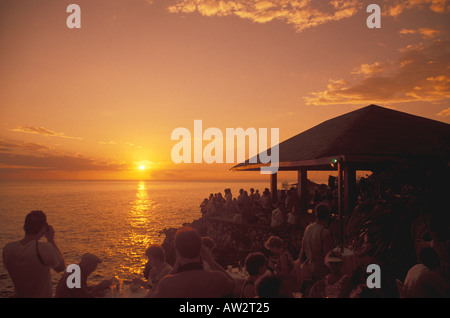 Jamaica Negril Sunset at Rick s Cafe, famous sunset celebration attraction. Stock Photo