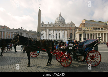 Horse and cart carriages wait for tourist passengers in front of St Peters Square Vatican City Rome Italy Europe EU Stock Photo