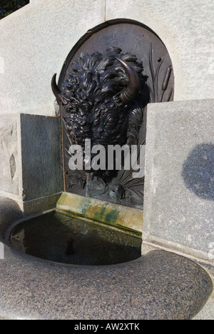 Detail of Bison head fountain on the base of the Soldier and Indian Guide statue on the grounds of the Iowa State Capitol Stock Photo