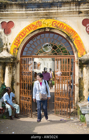 Tourist leaving Mattancherry Palace, also known as Dutch Palace, Mattancherry, Cochin, Kerala, India Stock Photo