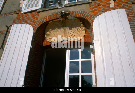 Scallop Shell as Decoration over door Chateau du Landel Rouen Normandy France Stock Photo