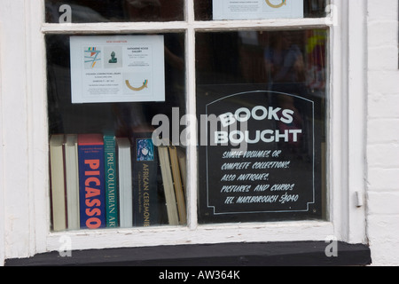 Notice in a secondhand bookshop window Books bought Stock Photo