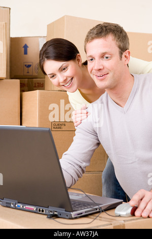 Couple looking at laptop Stock Photo