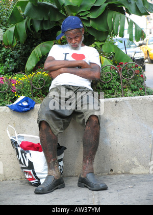 Homeless person sitting at Times Square, USA, USA, New York (state) Stock Photo