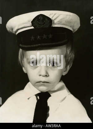 Little boy wearing captain outfit, Poland Stock Photo