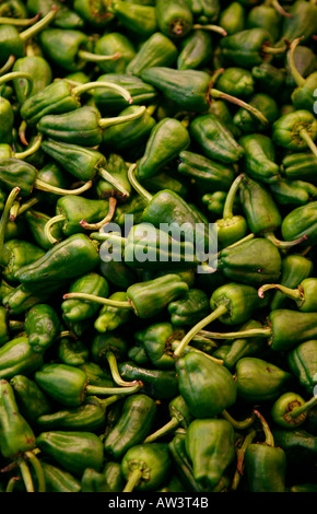 Green peppers on a market stall Stock Photo - Alamy