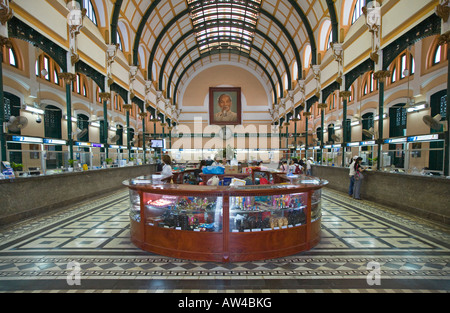 A portrait of HO CHI MINH presides inside the MAIN POST OFFICE in HO CHI MINH CITY SAIGON VIETNAM Stock Photo