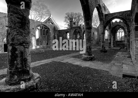 Interior of a burnt out church attacked by arsonists and left as a ruinous shell in monochrome Stock Photo