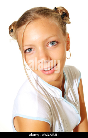 Self-confident, coquetting, blond young lady with braids. Young woman. Teenager. Girl. Blonde. Stock Photo