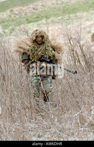 British Infantryman with a long range sniper rifle L115A3 which has a killing capability from over a mile. Stock Photo