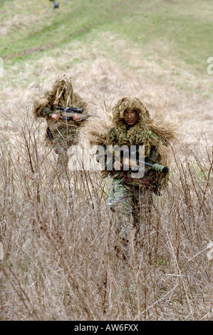 British Infantryman with a long range sniper rifle L115A3 which has a killing capability from over a mile. Stock Photo