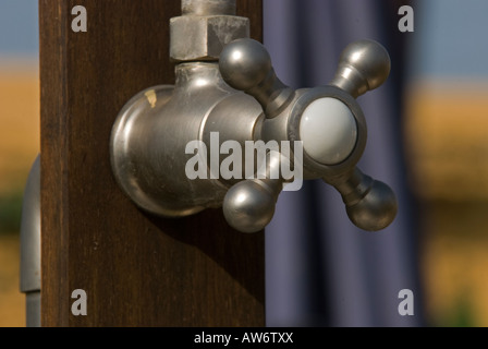 Water faucet from outdoor shower Stock Photo