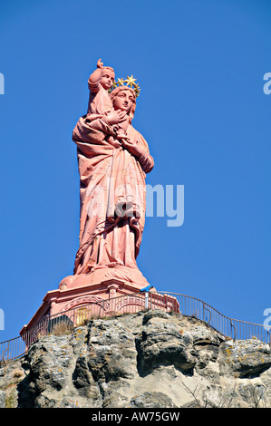 Statue of the Virgin Mary crowned with golden stars. Jesus Christ resting on his right shoulder.. Le-Puy-en-Velay, Auvergne, France Stock Photo