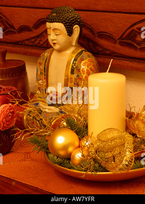 Christmas arrangement with Buddha Stock Photo