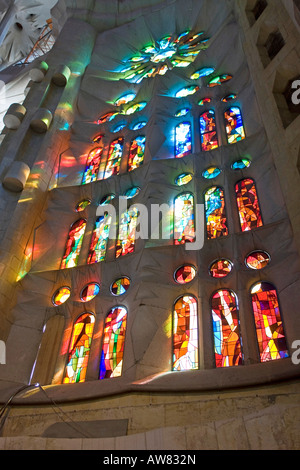 stained glass window detail in the Gaudi designed in Sagrada Familia Barcelona Spain Europe Stock Photo