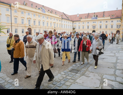 Tourists visiting the baroque benedictine monastery of Melk Abbey in the Wachau region in Austria Stock Photo