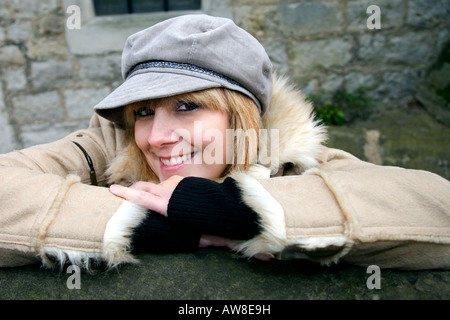 Japanese young woman wearing mauve kimono and winter time fur