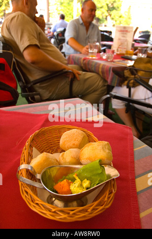 Bread rolls and herbal spread on a table in a restaurant in Warsaw Poland EU Stock Photo