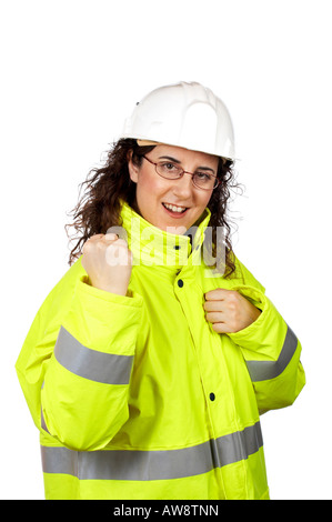 Expressive female construction worker over a white background Stock Photo